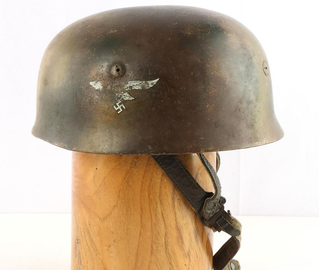 WWII GERMAN LUFTWAFFE PARATROOPER CAMO HELMET: German WWII Luftwaffe Paratrooper Fallschirmjager Camo Jump Helmet. This has the Normandy camouflage colors of reds, greens and tans. Has the four early three holed spanner type bolts. Includes the le