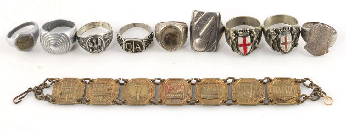 LOT OF 10 STERLING MASONIC AND MILITARY RINGS: Lot features Knights Templar Masonic rings, a Polish ring, a 1942 F.M.L ring, a crown ring, and a Paris bracelet. Some sterling but mostly not. Size 8 - 11.5. Very good condition.