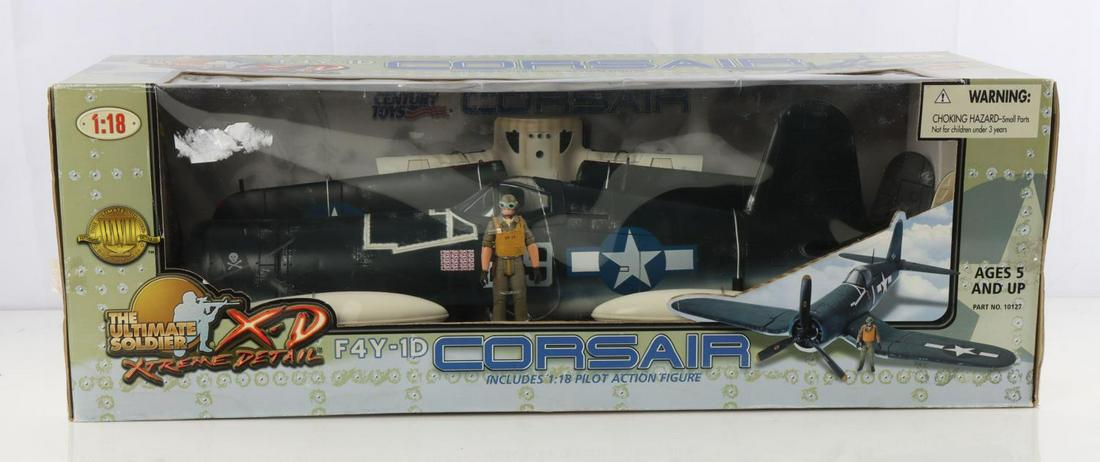 F4Y-1D CORSAIR WWII US FIGHTER PLANE MODEL 1:18: 1:18 scale, unopened in box. Comes with fighter pilot action figure as well. Box measures 26 inches wide by 9 inches tall by 10 inches long.