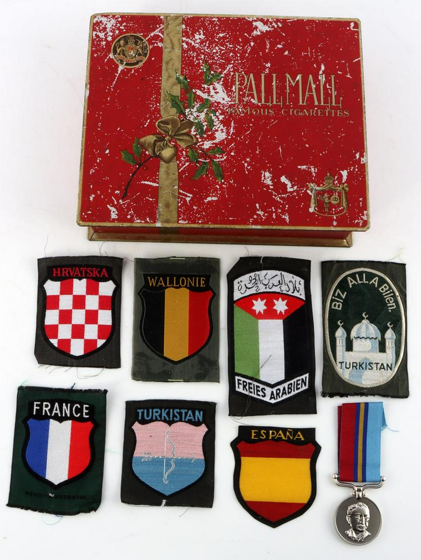 LOT OF VOLUNTEER PATCHES & BADGE IN PALL MALL TIN: Original 1920s Pall Mall cigarette tin with 7 foreign volunteer patches; 2 Turkish Legion, Croatian Legion, Spanish Blue Division, French Legion, Walloon Legion, and Free Arab Legion and 1 Rhodesian G