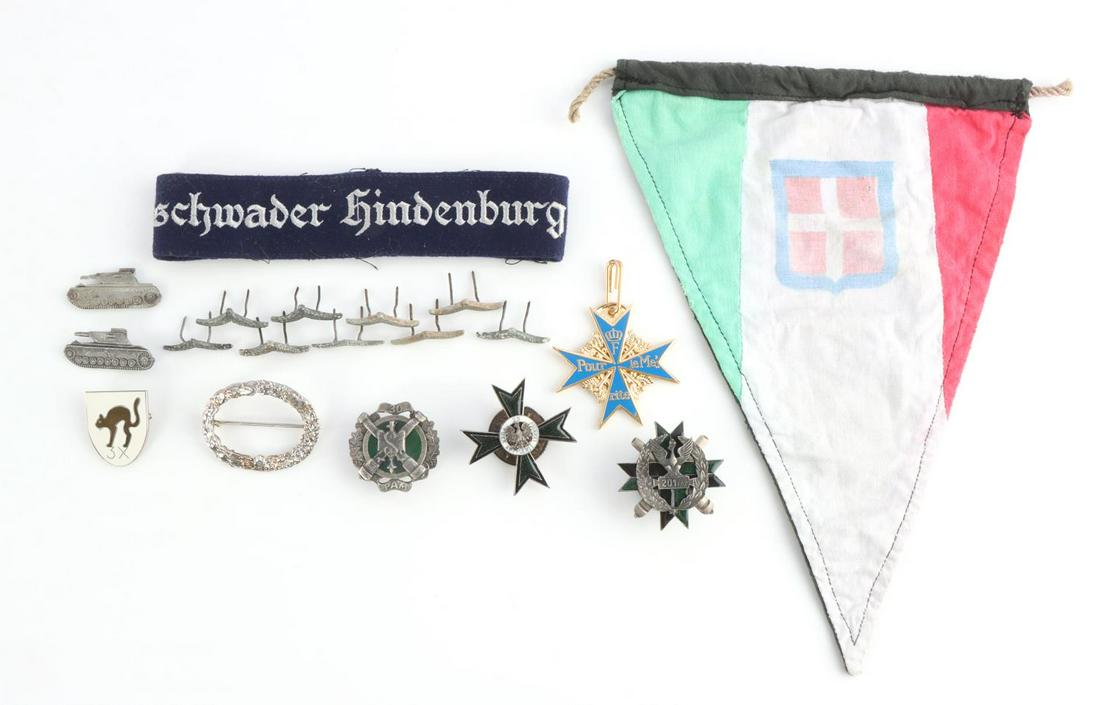 WWI GERMAN AND POLISH BLUE MAX HINDENBURG LOT: Lot features WWI German Pour le Merite Blue Max, Luftwaffe pins, Polish badges, Hindenburg cuff title, and more. Very good condition. Measurements range 1 3/4 - 6 3/4 inches. Age indeterminate.