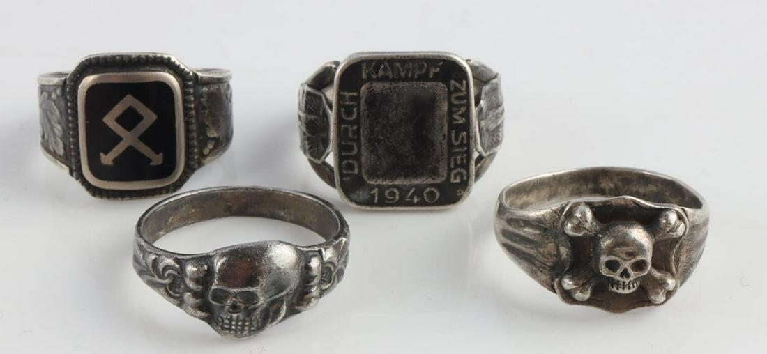 4 WWII GERMAN THIRD REICH SILVER RINGS SIZE 10 LOT: Lot of 4 WWII German Third Reich silver rings; all are approx size 10. Three of four acid test as silver (not skull ring), each have mild wear intermittent through with shanks slightly bent. Very good