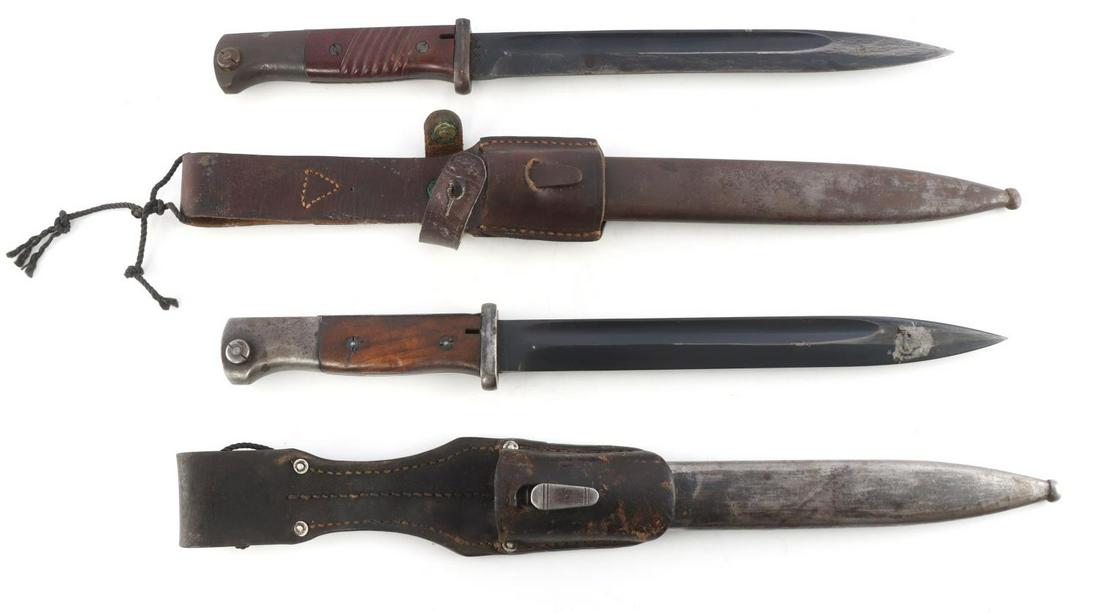 WWII GERMAN THIRD REICH TWO K98 BAYONETS WAFFENAMT: Two K98 bayonets include one marked "44 FZE" on blade ricasso with the serial number "8876." Composite handle with waffenamt marking "510" on pommel. "4177" marked on scabbard. Other bayonet has nicer