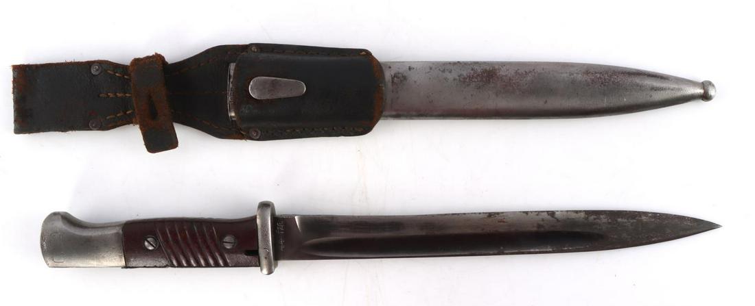 WWII GERMAN REICH K98 BAYONET KNIFE WAFFENAMT: Blade in good condition but with significant pitting on end. Marked "44 fze" and "1575" on ricasso. Composite handle in good condition with two Waffenamt markings on pommel. Scabbard marked "1878" and
