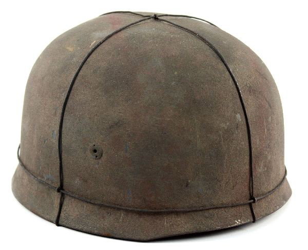 WW2 GERMAN FALLSCHIRMER PARATROOPER HELMET: A spurious WW2 Paratrooper German helmet, may have a few original parts but primarily a display piece.