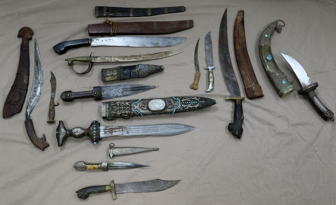12 WORLD KNIFE BOLO DAGGER MIDDLE EAST BLADE LOT: Lot measurements range from 6 to 22 inches. Some are quite nice with stone and jade inlay and stag and horn grips. As photographed.