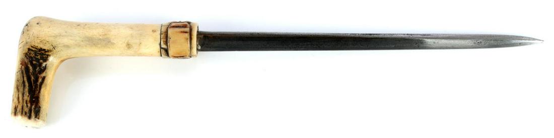 ANTIQUE STAG GRIP SWORD DAGGER WALKING STICK CANE: Stag grip with a push button that releases a 9 1/2 blade, with grip 14 inches. 2 piece metal ferrule tip. Overall cane length measures 33 inches. In very good original condition.