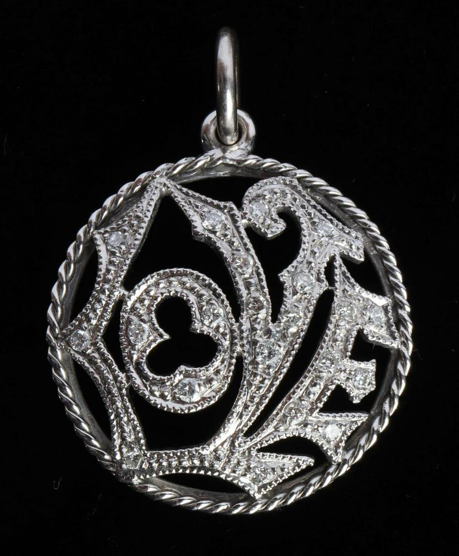 CATHY WATERMAN PLATINUM DIAMOND BABY LOVE PENDANT: Baby Love platinum and diamond pendant by designer Cathy Waterman (diameter 21mm, 7/8 inch). Total weight of 3.6 grams. This lot has a reserve.