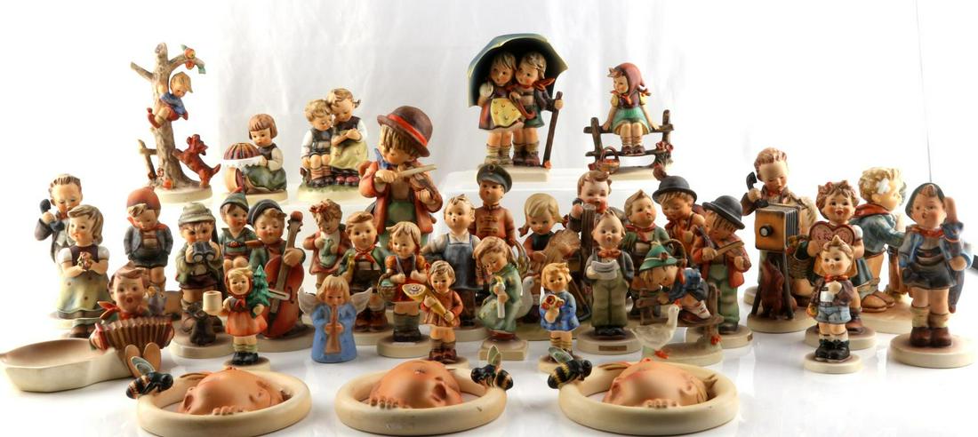 40 GOEBEL GERMANY HUMMEL PORCELAIN FIGURINES: Lot of 40 Goebel made in Germany Hummel porcelain figurines. Majority are signed, many are exclusive Hummel Club editions, majority are vintage. Rare ash tray is included. All figures, with the except