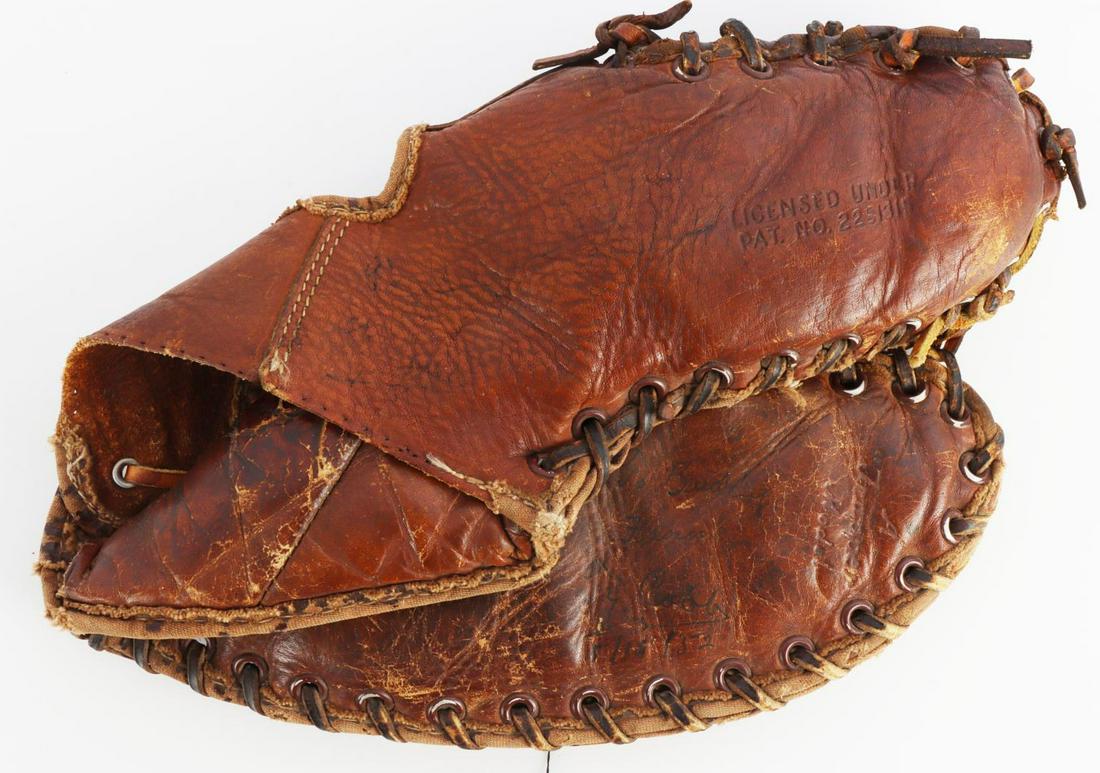 SIGNED TY COBB BASEBALL GLOVE WITH COA: Trapper model glove. Autograph reads "To Buddy from Ty Cobb" and dated 5/15/52. Written in pen. COA from Autograph Authentication Institute. Very good condition. This lot has a reserve.