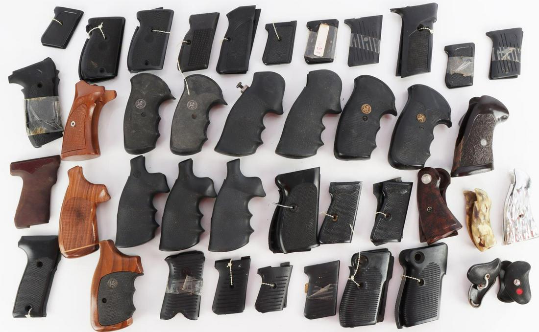 MIXED LOT OF PISTOL AND REVOLVER GRIPS PACHMAYR: Large variety lot includes Pachmayr, Smith & Wesson, Franzite, and more. Very good condition. Measurements range 2 - 4 3/4 inches.