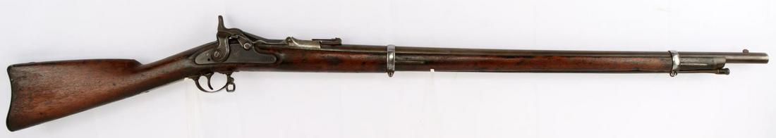 US SPRINGFIELD SCARCE 1870 EAGLE TRAPDOOR RIFLE: Springfield 45-70 scarce 1870 "Trapdoor" rifle with barrel featuring a bright and clear bore with deep and distinct rifle marks. Action is smooth, as is trigger and hammer. Serial number "45592" found
