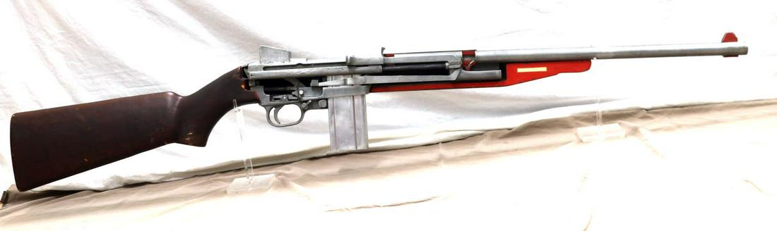 US GI WORKING M1 CARBINE 3D CUT AWAY MODEL: Large model of a M1 carbine used to teach troops during WWII. Shows working internals. Can be cocked, trigger mechanism works, and magazine can be removed and reattached. Measures 71 inches.