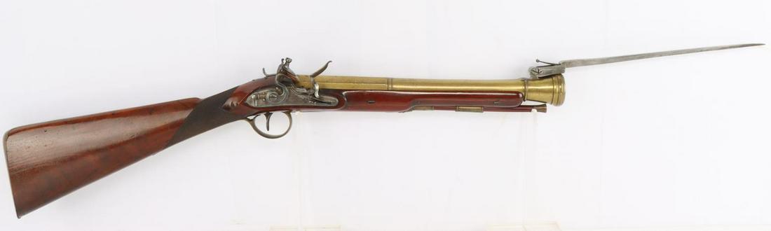 PHILIP BOND FLINTLOCK BLUNDERBUSS SNAP BAYONET: This blunderbuss was manufactured by Philip Bond c. 1800-1816 with a brass barrel marked "No 45 CORNHILL LONDON" on top, stamped with Ordnance Proofs on the upper left, an engraved floral border at th