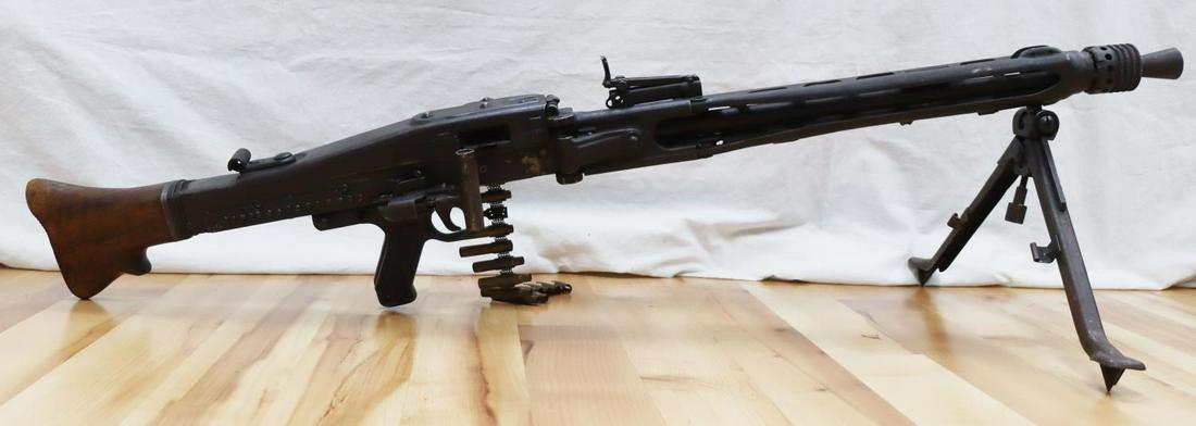 WWII GERMAN INERT MG42 YUGOSLAVIAN CAPTURE: WWII German Reich Maschinengewehr 42 demilitarized in good condition. Many parts appear to have differing serial numbers. Feed cover and action have been welded shut. Yugoslavian crest is found on fee