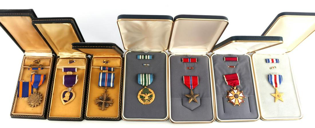 US MILITARY MEDAL LOT SILVER BRONZE STAR AND MORE: Medals featured are a Silver Star, Bronze Star, Air Medal, Purple Heart, Legion of Merit, Joint Service Commendation, and Distinguished Flying Cross. Very good condition. Measure approximately 2 inche
