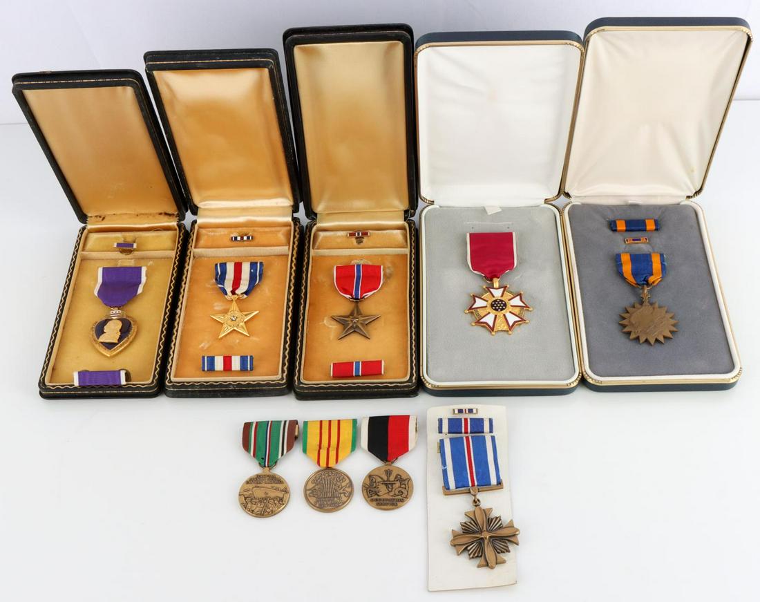 US MILITARY MEDAL LOT SILVER BRONZE STAR AND MORE: Medals featured are a Silver Star, Bronze Star, Air Medal, Purple Heart, Legion of Merit, Republic of Vietnam Service, Occupation Service, European African Campaign, and Distinguished Flying Cross. Ve