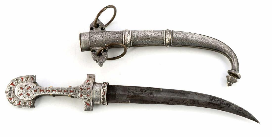 QUALITY ANTIQUE SILVER INLAID AFRICAN JAMBIYAH: Silver inlaid scabbard and handle top. Intricate pattern and red paint on handle. Steel blade. Measures 16 1/2 inches. Very good condition. Reverse also has intricate pattern in brass. This lot has a 