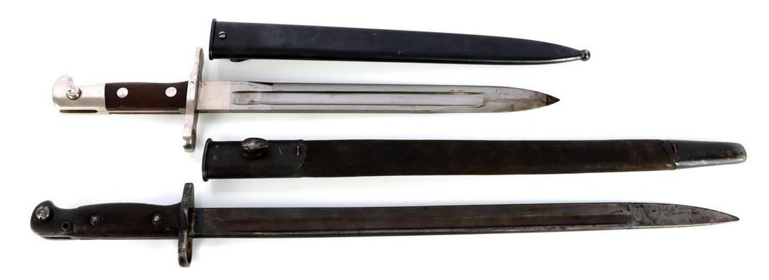 2 WWI BRITISH WILKINSON & SWISS M 1918 BAYONET LOT: British Enfield rifle Model 1907 Wilkinson bayonet, very good original condition, in very good leather scabbard, overall length in scabbard 22 inches, Swiss model 1918 Neuhausen maker, near unissued c