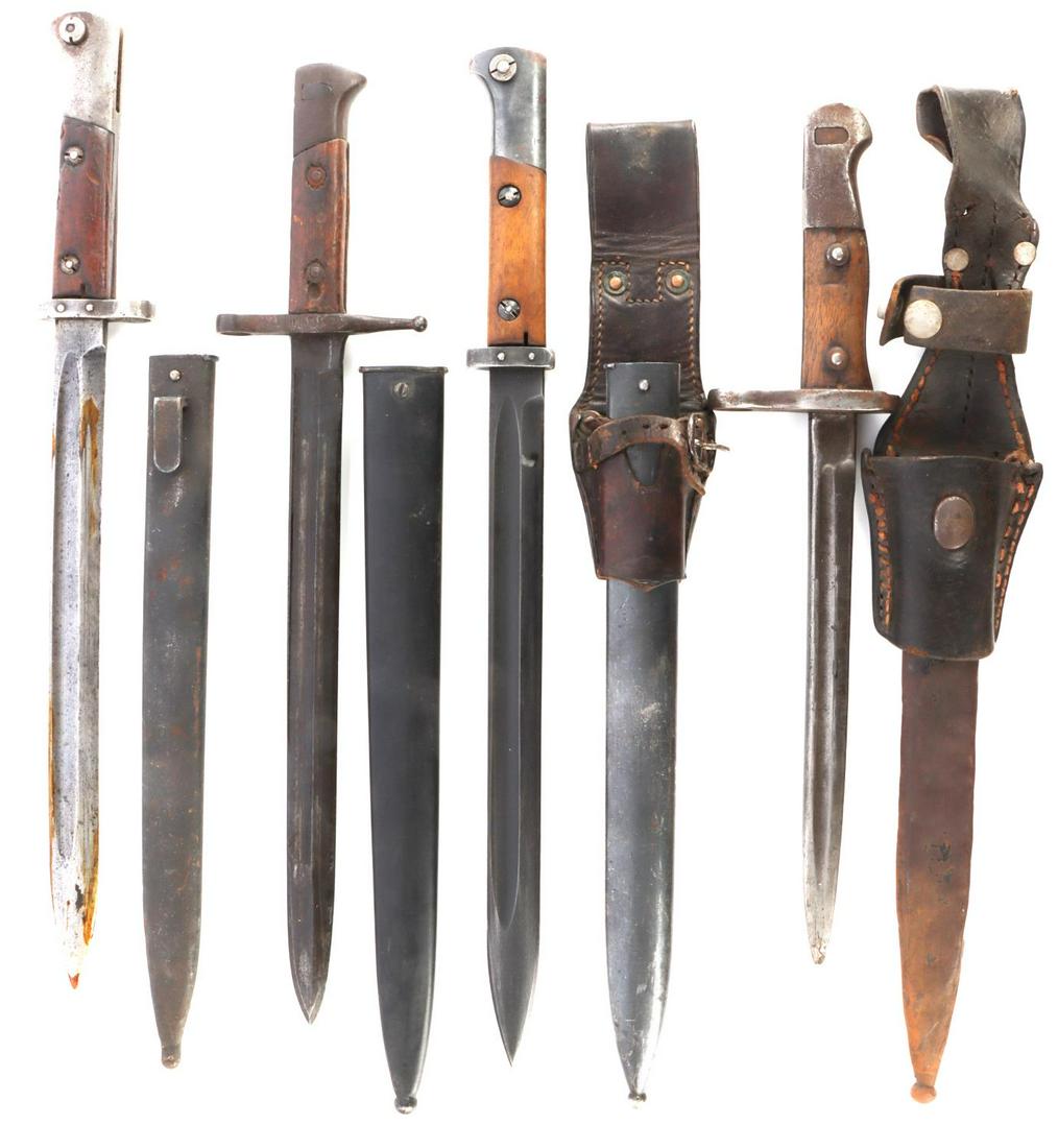 WWI WWII BAYONET LOT OF 4 ITALIAN CZECH AUSTRIA: Italian bayonet with scabbard used but very good, 2 Czech , the 1 with frog has near mint blade, CSV stamped blades, the last an Austrian, has ground blade and field repaired frog.
