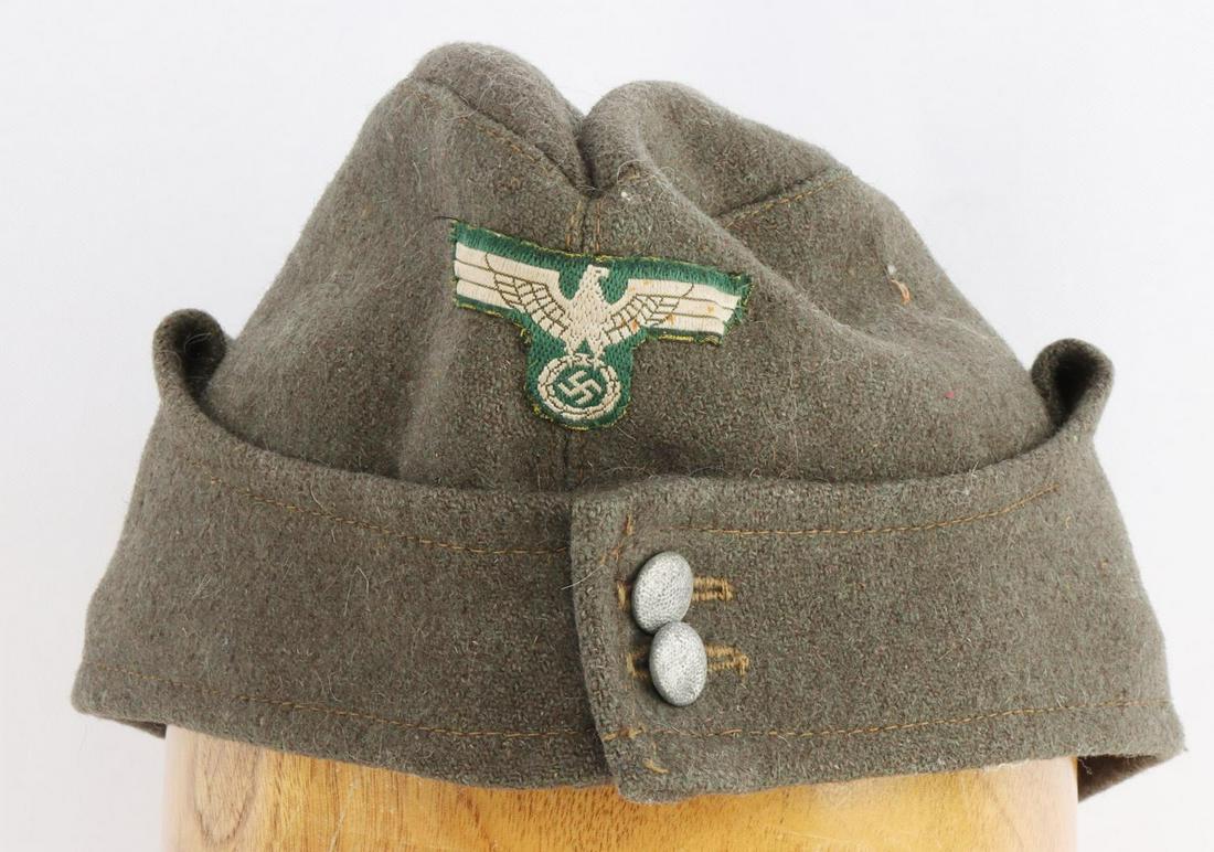 WWII GERMAN THIRD REICH ARMY ENLISTED CAP: Patch does not fluoresce. Size 58. Pebbled buttons marked Assmann 12mm. Ink stamped "Willy Sprengpfeil Mutzenfabrik Hamburg 1942." Very good condition.