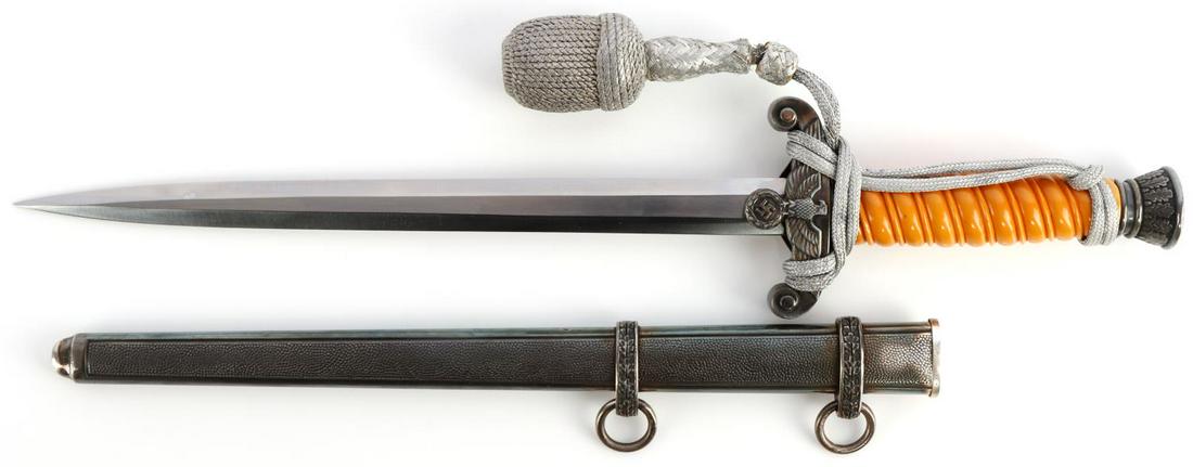 WWII GERMAN THIRD REICH ARMY HEER DAGGER: Steel blade with silver plated nickel cross guard and pommel. Bakelite grip. Housed in pebbled scabbard. Crisp F W Holler mark. Very clean blade. Scabbard, crossguard, and pommel all have matching ton