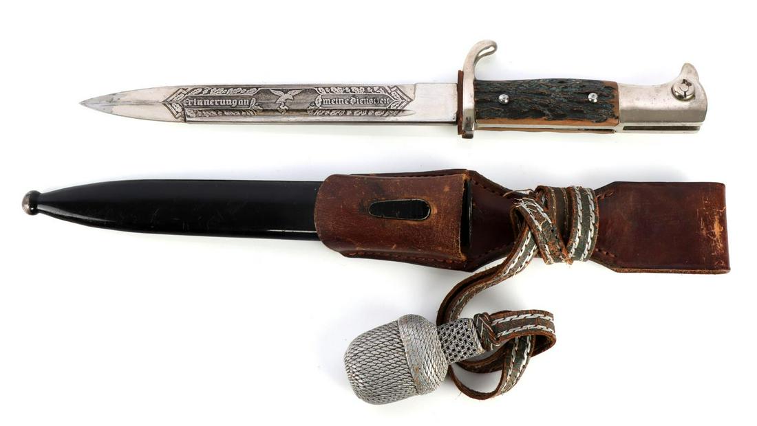 WWII GERMAN THIRD REICH CONDOR LEGION BAYONET: Nickel plated steel blade with Condor Legion engraving and Alcoso maker mark, plated crossguard and pommel, and stag grips. Housed in steel scabbard with leather frog and portepee. Frog marked DRGM 1/