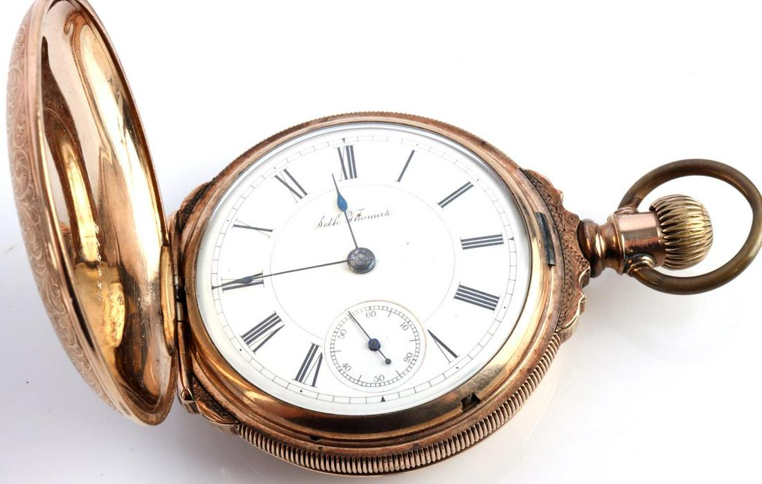 ANTIQUE SETH THOMAS POCKETWATCH POCKET WATCH: Model 2. Size 18. Stem wind lever set. Not over wound, a few turns and it starts on its own, keeps time but slow. Very good gold fill hunter case. Porcelain face has hairline around the 9 o'clock posi
