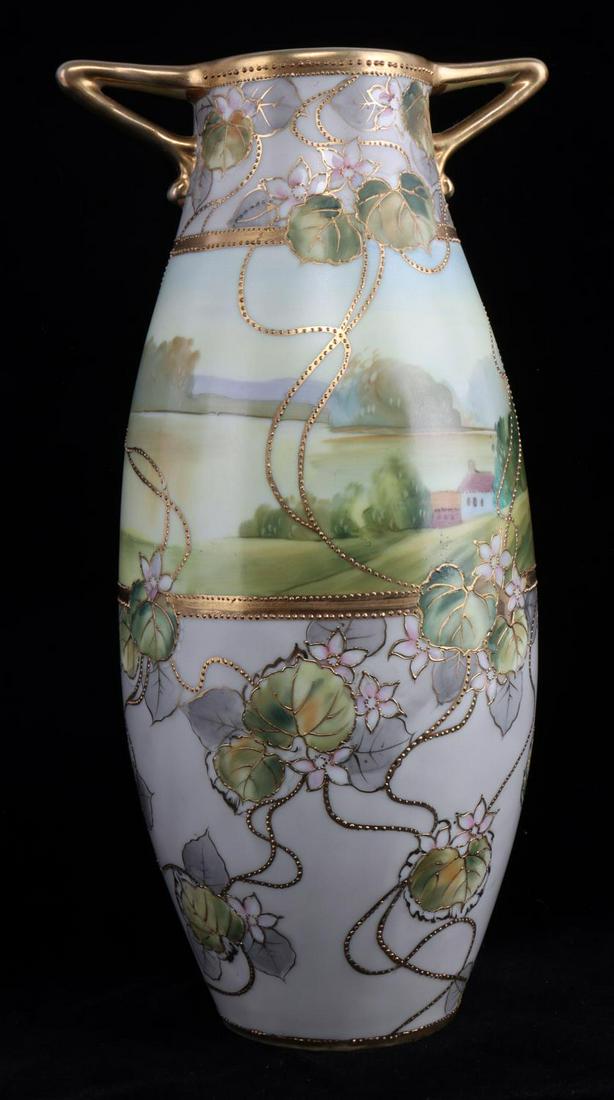 ANTIQUE NIPPON PORCELAIN VASE: Circa 1891-1921 Nippon stamped. Hand painted Japanese porcelain vase. Measures 11.5 inches with a 5.5 inch diameter. In very good condition with no chips, cracks or repairs.
