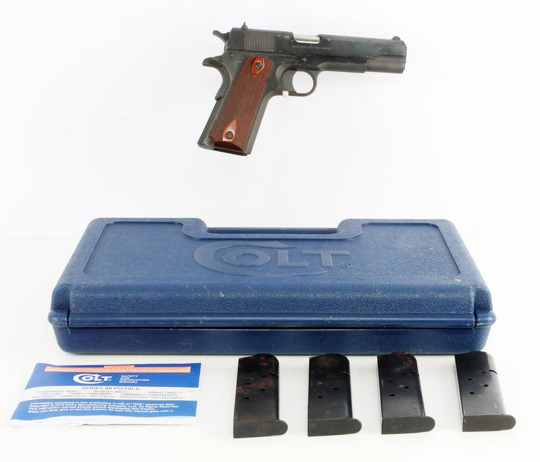 COLT GOV MODEL 1911 SERIES 80 PISTOL IN CASE: Colt government Model 1911 Series 80 pistol. Action is smooth and functions without issue. Finish loss and some oxidation throughout steel finish. Comes with 4 magazines and in original blue hard case