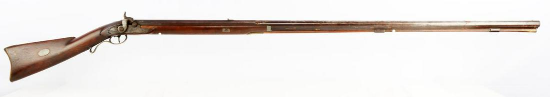 I.P. MOORE PERCUSSION FOWLER 20 GAUGE MUSKET: I.P. Moore percussion fowler 20 gauge musket with barrel measuring about 46 1/2 inches long with a clear bore. Action is smooth, hammer functions at half and full cock. Ram rod present. Marked "Warran