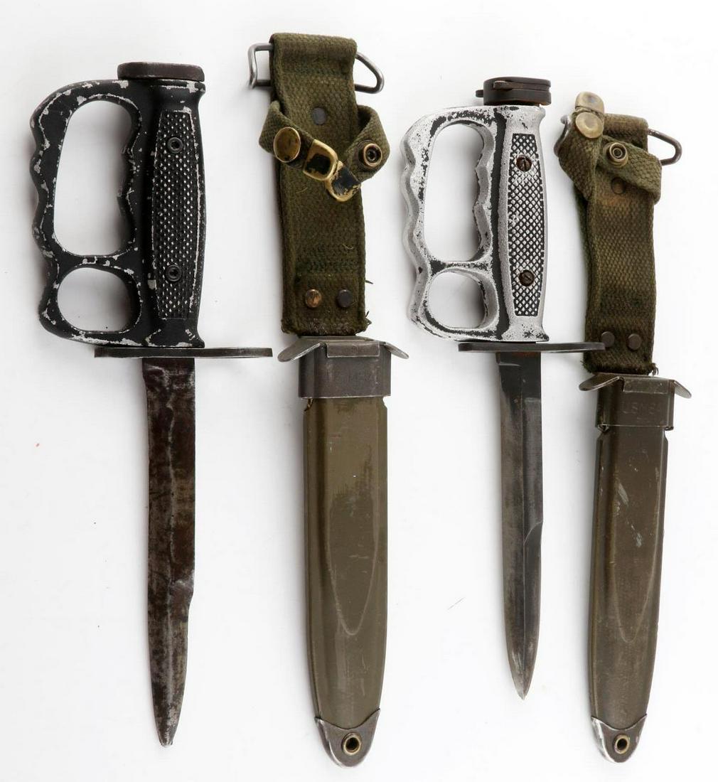 2 US VIETNAM M7 KNUCKLE DUSTER BAYONET KNIFE: Steel knife has a 6.75 inch blade, checkered black metal knuckle duster grip, US M7 marked to top of guard, and US M8AI metal sheath.