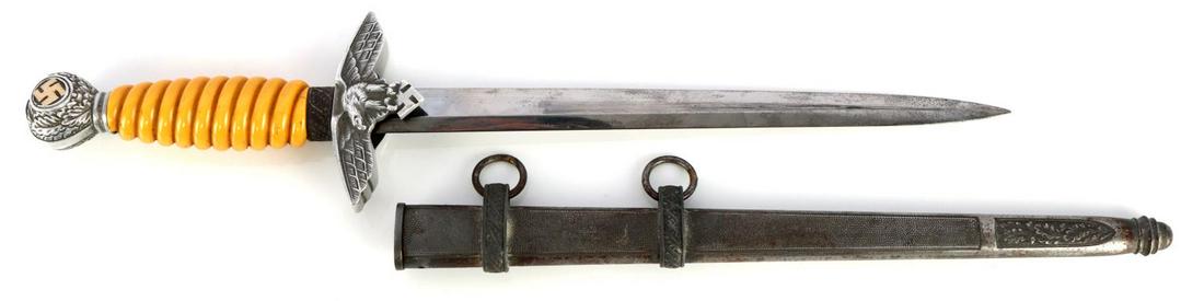 WWII GERMAN THIRD REICH LUFTWAFFE DAGGER: Steel blade with bakelite grip, aluminum crossguard, and aluminum pommel. Eickhorn marked. Housed in pebbled scabbard. No filing on tang. Very good condition.