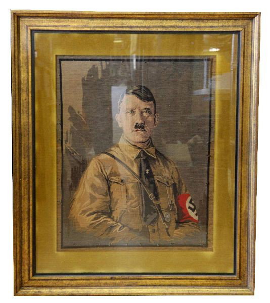 ADOLPH HITLER TAPESTRY LARGE VARIANT 23 BY 28: Captured Adolph Hitler larger variant tapestry 23 by 28 inches. Placed in a non period later frame measuring 23 by 28. Holes present around the border where it is presumed to have been removed from a 