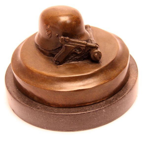 WWII GERMAN BRONZE HELMET GRENADE & LUGER: Desktop size bronze of a WWII German helmet, with a stick grenade and Luger pistol to either side. Good detail. Measures about 3.5 inches tall, including marble base, and about 4.5 inches in diameter 