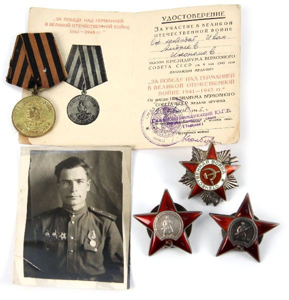 NAMED WWII SOVIET RUSSIAN MEDALS WITH PHOTOGRAPH: Collection of named Soviet Russian WWII medals. Lot includes two Orders of the Red Star, Order of the Patriotic War, Medal for Victory over Germany Var 2, and Document for Victory over Germany medal. 