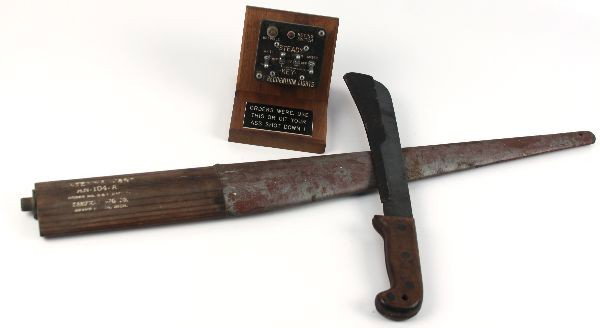 P47 PILOT SURVIVAL KNIFE ANTENNA MAST RECOG SWITCH: Grouping from a WWII P-47 Pilot estate, it includes his Case XX jungle survival knife, original P-47 antenna mast , and Recognition Light Switch assembly on a wooden display stand with a plate reading