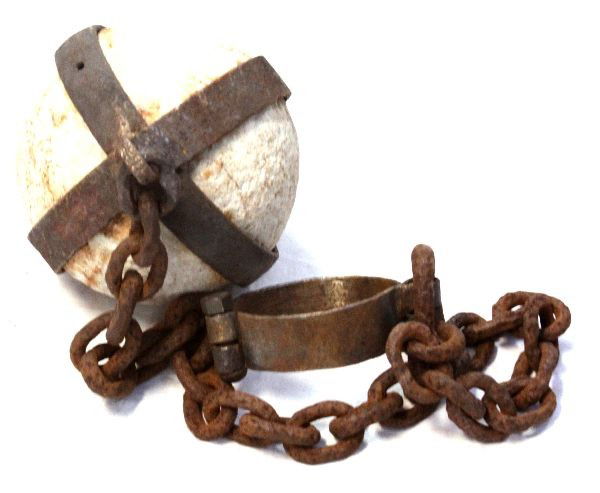 ANCIENT PRISON BALL WITH CHAIN & IRON: Ancient stone prisoner's restraint ball. Iron work, chain, and leg iron were later added for display purposes. Approximately 8 inches in diameter, with 45 inch chain. Very good condition. Weighs 50-60
