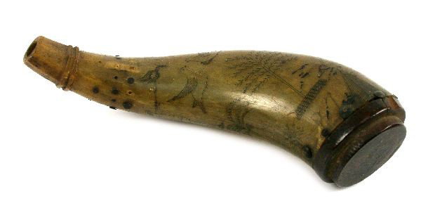 PATRIOTIC ANTIQUE ENGRAVED POWDER HORN: Antique patriotic engraved powder horn. Measures 8.5 inches long, 7 inches wide. Engraved with nautical scene including sailors, 26 star flag, and peace doves. The 26 star flag was adopted in 1837. Ho