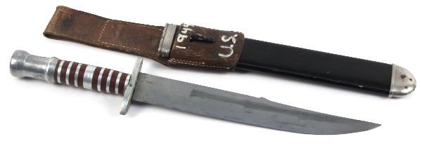 WWII BOWIE FIGHTING KNIFE IN RED CROSS HEWER: Interesting fighting knife, a trench art blade of 10 inches, contained in a presumed liberated German Red Cross Hewer scabbard, additionally the frog is marked U.S. 1944.