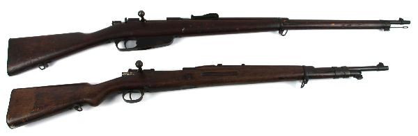 TWO DEMILLED MILITARY RIFLES CARCANO & MAUSER: Lot of two non firing military display rifles. Am Italian M91 Carcano, and a Spanish M93 Mauser. Barrels are filled with steel solder, rendering both rifles inoperable. Useful for display or parts onl