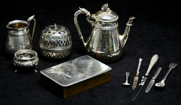 LARGE LOT OF STERLING SILVER, SOME WITH HALLMARKS: Lot includes silver topped cigarette box (Russian sterling), small pitcher, lidded pitcher, salt cellar with spoon, letter opening with sterling handle, sterling oil lamp cover (Black, Starr & Frost),