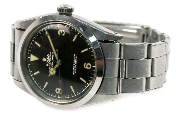 VINTAGE MEN'S ROLEX OYSTER EXPLORER STAINLESS: Mid 1950's Rolex Oyster Explorer, model 1016, registered design, stainless steel, non-gilt face, non-hacking movement. Serial number 516961. Condition: Watch is in good working order, recently service