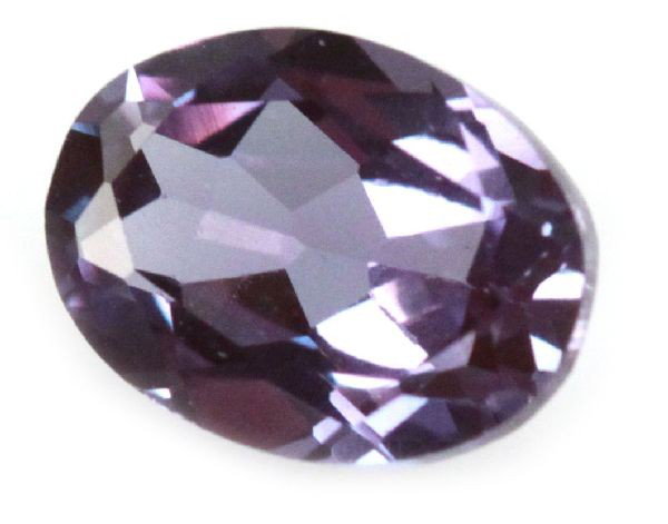 RUSSIAN COLOR CHANGE ALEXANDRITE 1.4 CTS: Oval cut, eye clean. Condition: Very good