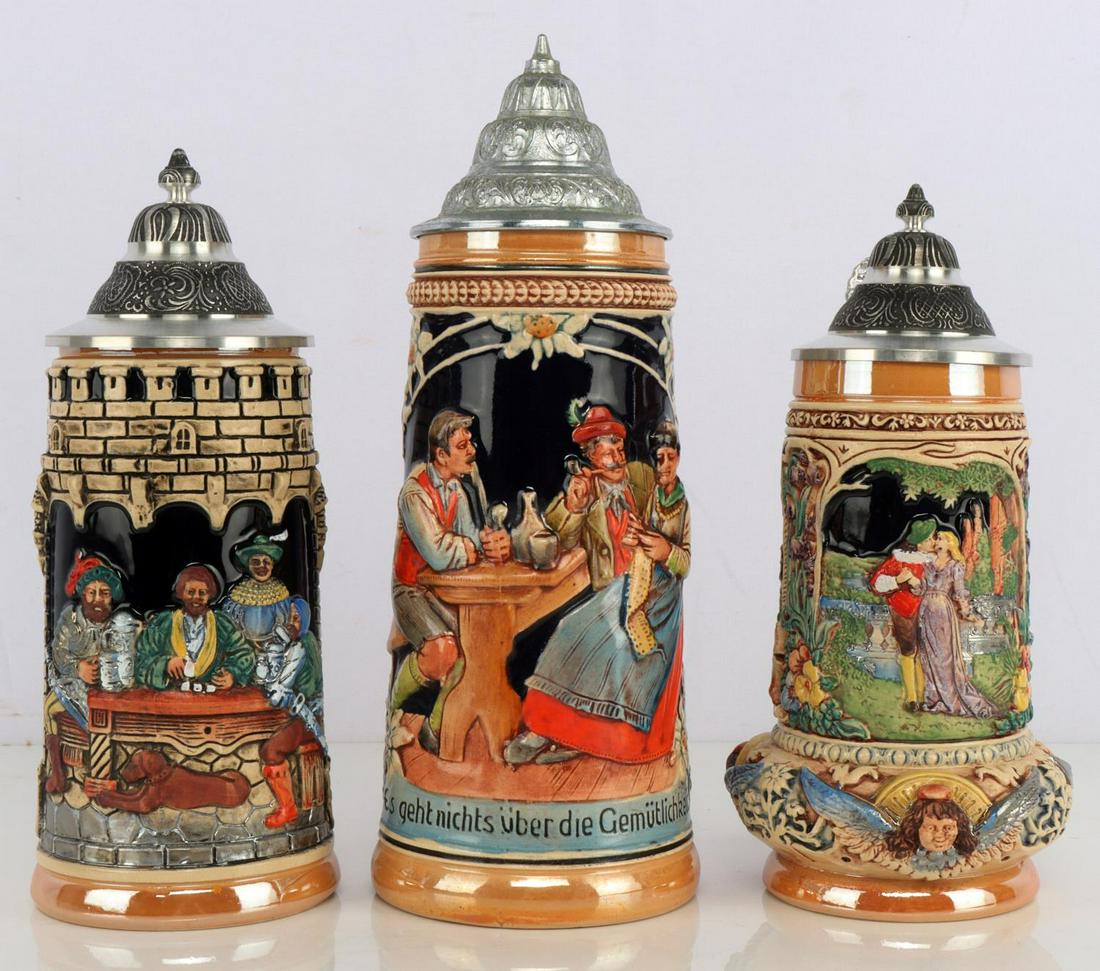 3 GERMAN STEIN LOT 2 LIMITED EDITION THEWALT 1893: The 2 Thewalt, each stand 9 1/2 inches and are limited edition of 2500, one is 203 the other 262, the third is 1940's and stands 11 inches, none are Lithopane, all are very good condition. This lot ha