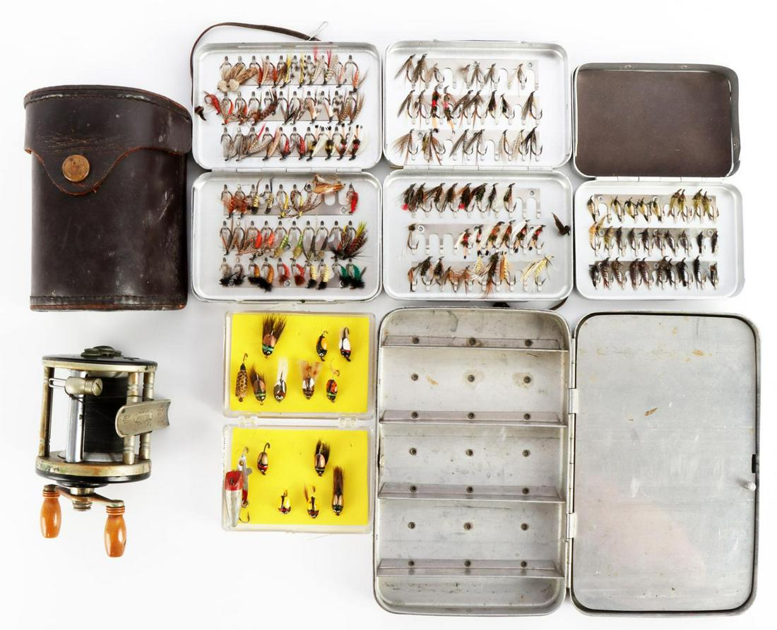 OVER 100 FLY FISHING NYMPHS & J.A. COXE REEL: over 100 fly fishing hand painted nymph lures in good condition. Also includes J. A. Coxe model # 25 fishing reel in original leather case.