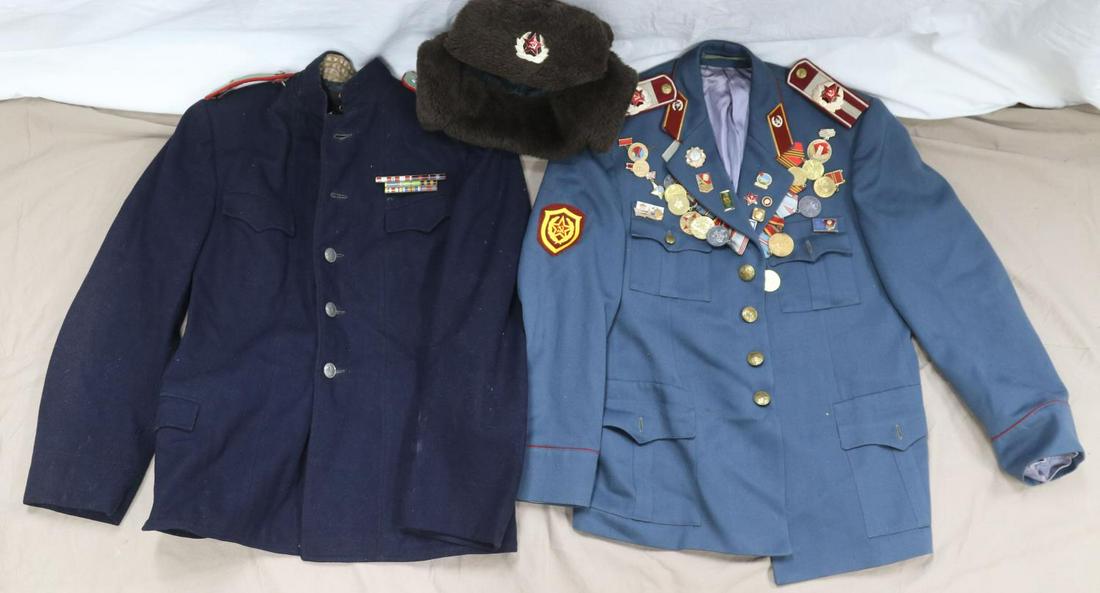 RUSSIA USSR SOVIET ARMY & NAVY TUNIC W MEDALS: Fur cap with insignia, Navy officers wool tunic, small size with ribbons, Russian army officer tunic with medals and insignia, small size.