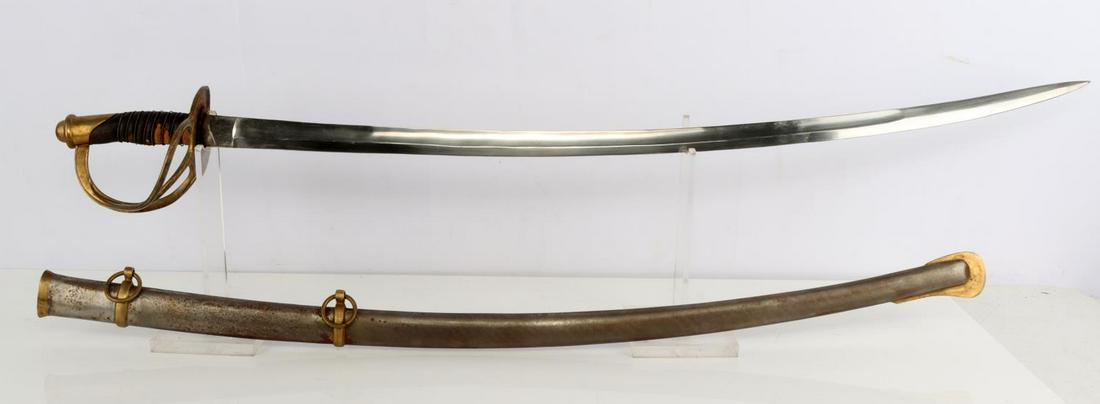 CONFEDERATE STATES CAVALRY WRIST BREAKER: Steel blade with brass guard and leather grip. Housed in steel scabbard. Crown & bicorn marked with 1862 CSA. Measures 42 inches. Unauthenticated, sold as is.