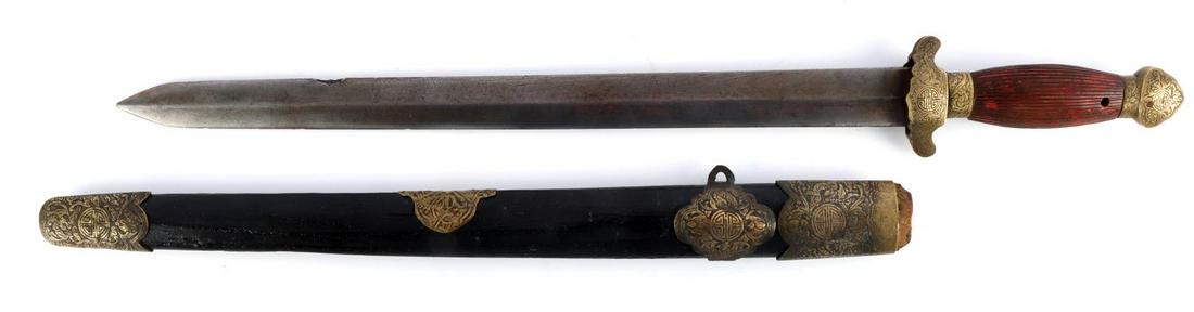 EARLY CHINESE DAGGER SHORT SWORD: Early Chinese dagger/short sword with wooden scabbard. Blade measures 16 1/4 inches long.