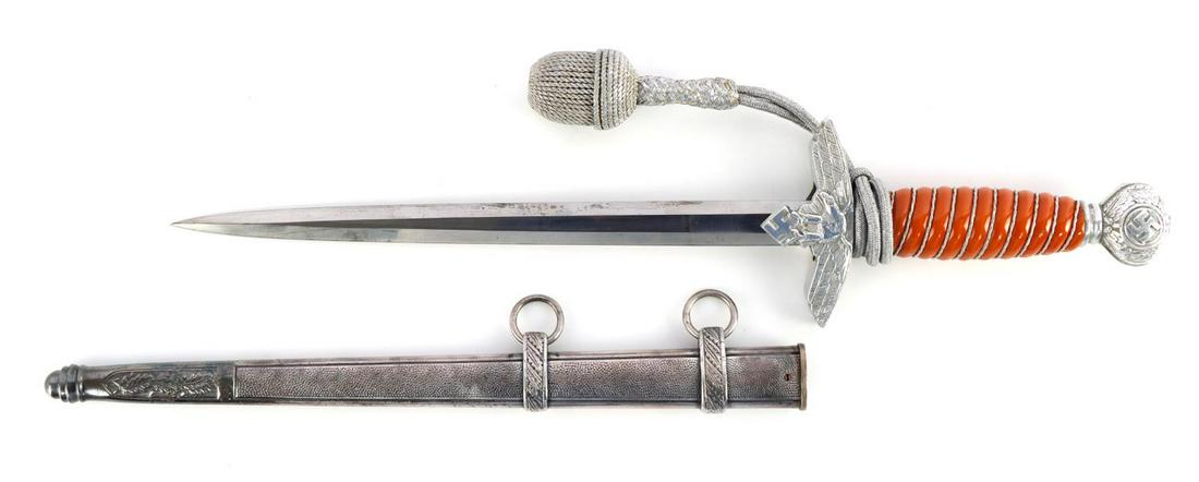 WWII GERMAN LUFTWAFFE HERDER DAGGER W SCABBARD: WWII German Luftwaffe 2nd Model dagger with scabbard and portepee. Aluminum crossguard, ferrule, and pummel. Orange celluloid grip with silver colored twisted wire wrapped. Bright and clear blade with